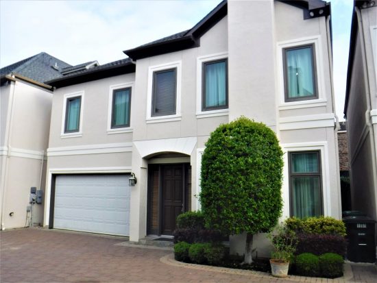 Stucco home after painting