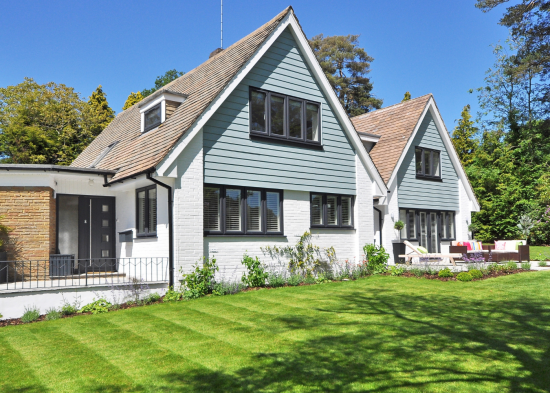 blue and white brick and siding home