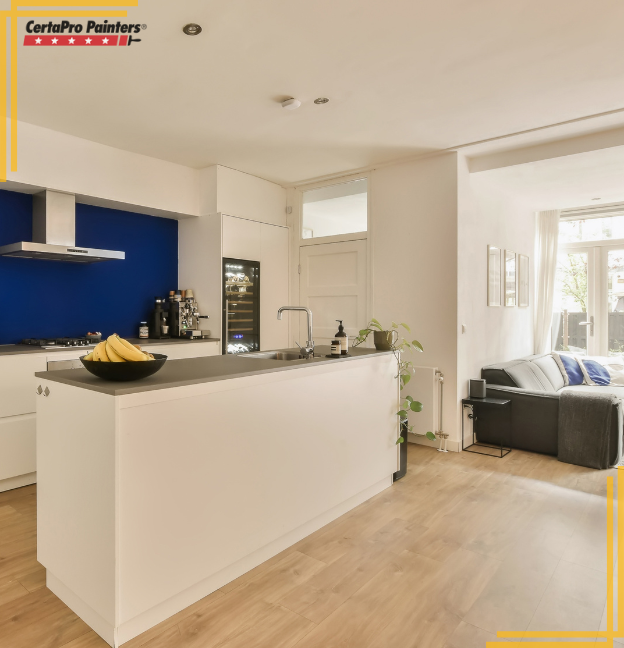 kitchen with island and blue backsplash wall