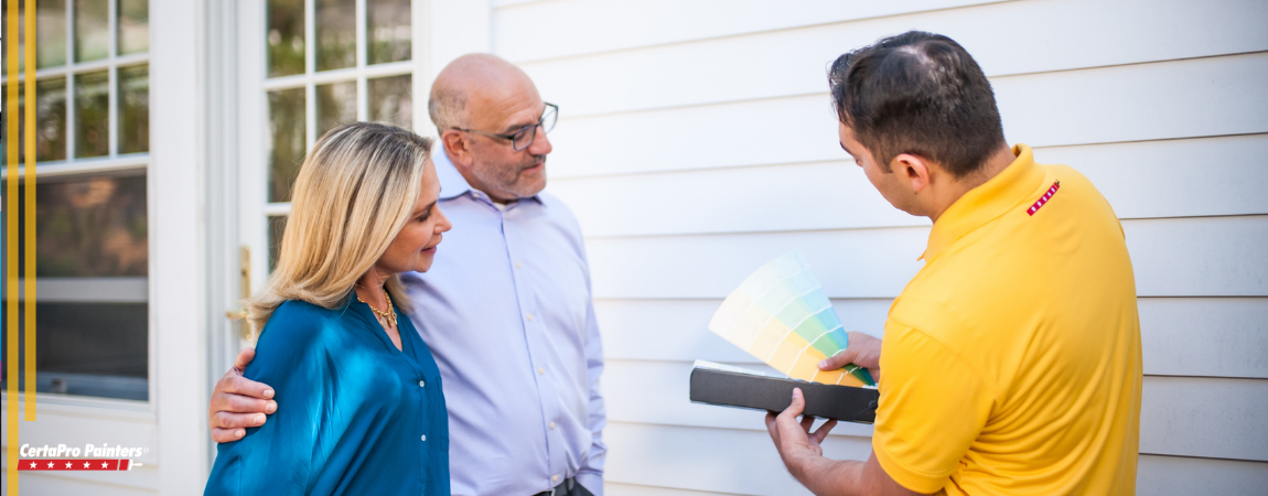 CertaPro color consultant helping homeowner choose exterior paint colors
